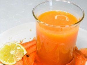 Detoxifying Herbal Drinks Orange Cucumber Detox Water In A Glass