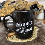 Strange and Unusual Mug