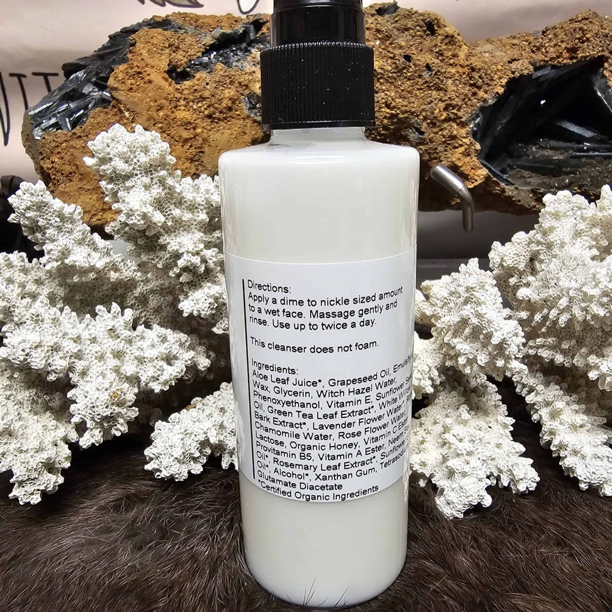 Green Tea Facial Cleanser Green Tea Facial Cleanser In A White Bottle