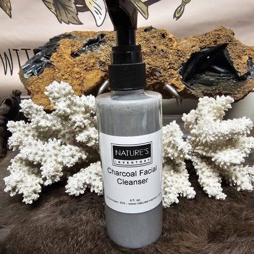 Activated Charcoal Facial Cleanser in a white bottle