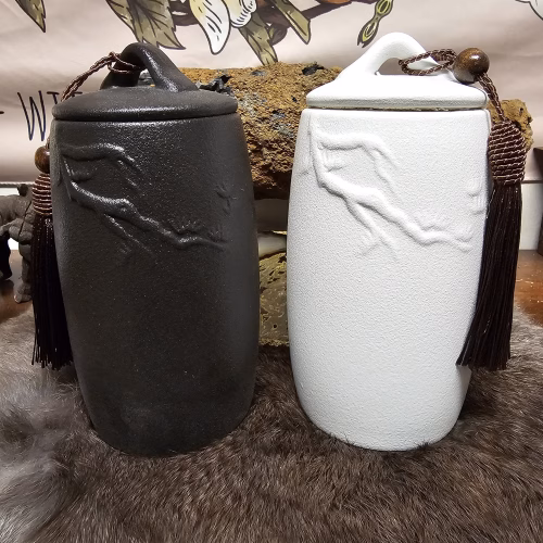 Embossed Ceramic Tea Canister with two different colored tea canisters