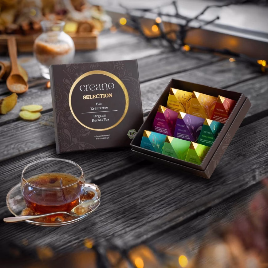 Organic Herbal Tea Pyramid Gift Set With Nine Different Types Of Tea Boxes On The Table Organic Herbal Tea Pyramid Gift Set With Nine Different Types Of Tea Boxes On The Table Photo